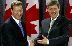 A young Peter MacKay (left) and Stephen Harper join forces in 2003